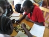 Two high school girls playing at the Kakemer Resource Center in Kenya
